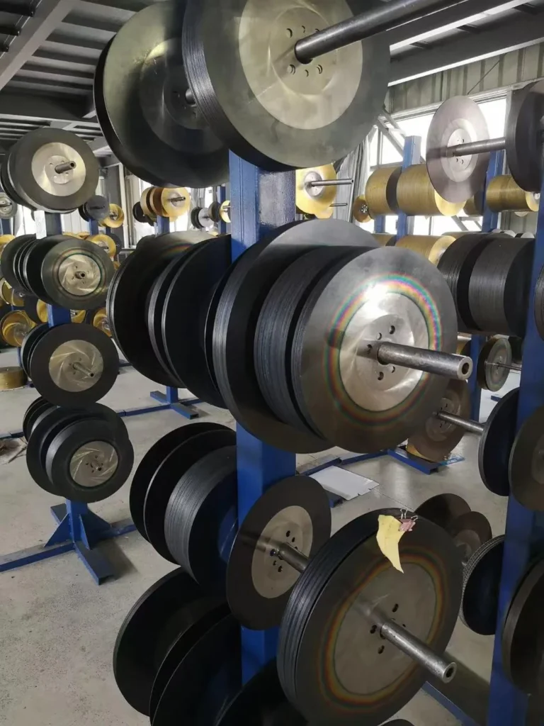 Racks holding circular saw blades with different coatings
